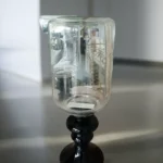 Glass and Black Lantern Like Accessory