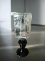 Glass and Black Lantern Like Accessory